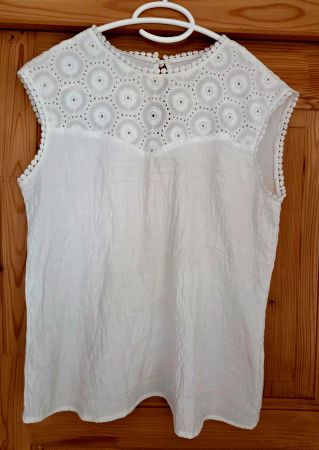 Top blanc sans manches taille S état neuf