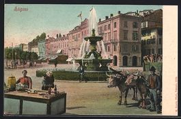 Lugano, Ortspartie mit Brunnen und Mann 