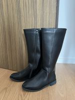 Black leather knee-high boots