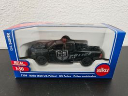 Neu - Siku - 2309 - RAM 1500 US-Polizei