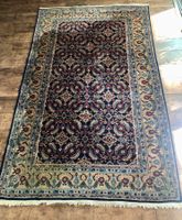 Tapis ancien persan – bleu à motifs floraux (192 × 122 cm)
