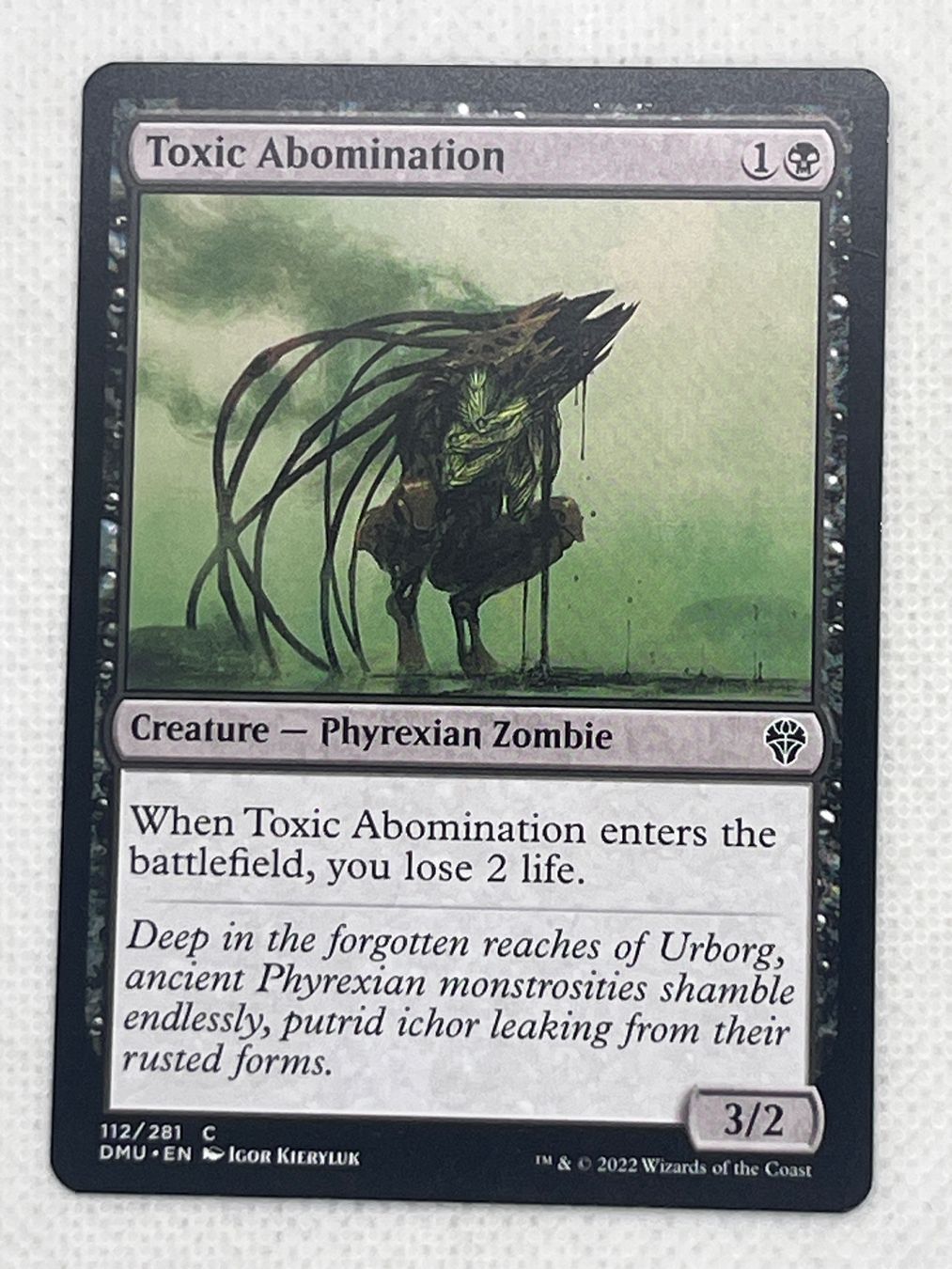 Magic The Gathering Carte collezionabili: Magic: The Gathering - Toxic Abomination DMU Common 💀 – Usato da Hinterkappelen venduto da Kim1992