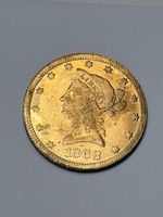 Pièce reproduction Dollars USA 1868 état usagé 7.47g