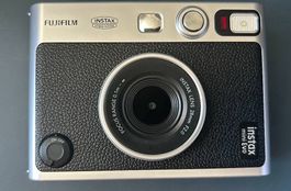 Instax Mini Evo (polaroid camera, instant camera)