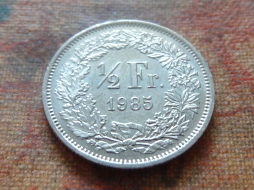 Tutti le monete: 1/2 Fr. 1985 – Usato da Romanel-sur-Lausanne venduto da Swift13
