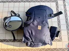 Imbragatura marsupio porta neonato e specchio auto 