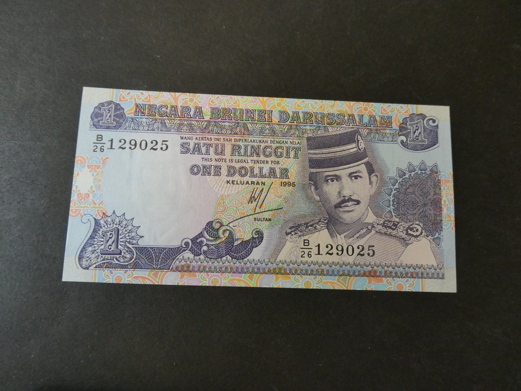 Banconote: Brunei 1995, 1 Dollar  - ungefaltet – Usato da Hinterforst venduto da Rohusri