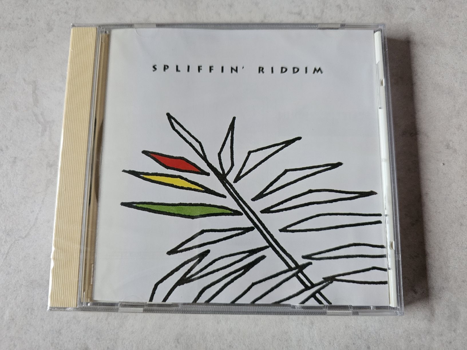 CD: Spliffin' Riddim  -  Rhythms For Reggae Lovers  /  Fabrikneu – Nuovo e nell'imballaggio originale da Schneisingen venduto da backstore24