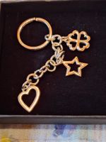Porte-clé en métal avec pendentifs marque Unoaerre