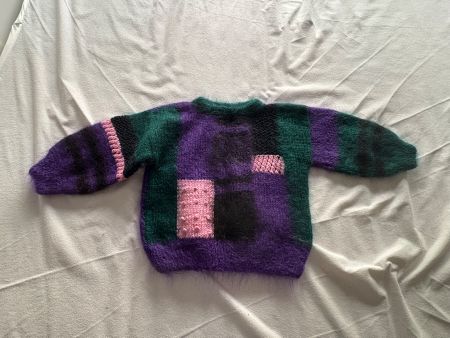 Handgemachter Pullover