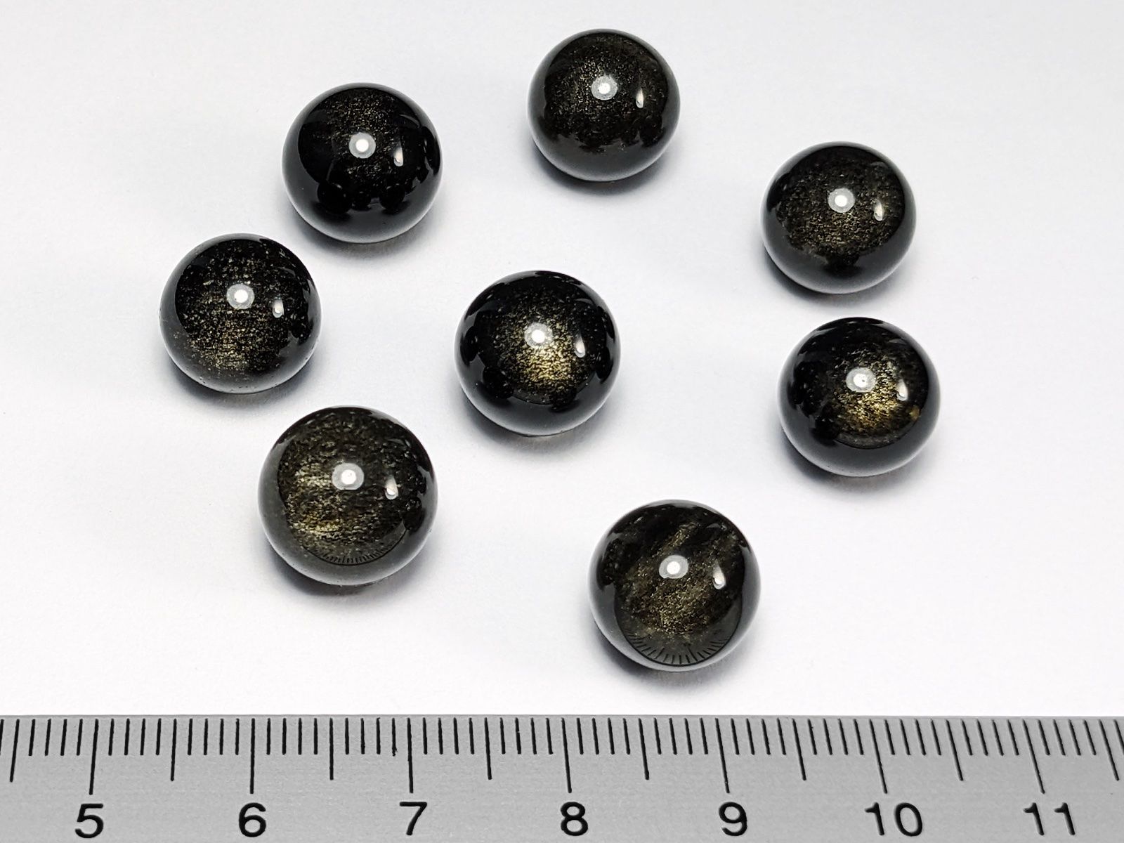 Minerali & Pietre curative: Gold-Obsidian Kugeln 11 bis12mm 8Stk. – Usato da Meilen venduto da StoneGarden