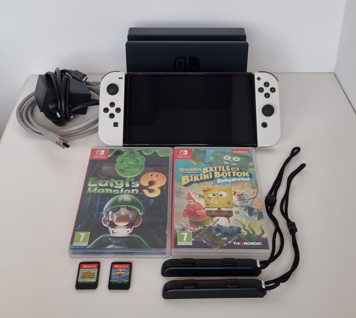 Nintendo Console: Nintendo Switch OLED inkl. 4 Spiele & Zubehör – Usato da Gontenschwil venduto da shop2hand