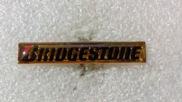 Ansteckpin 211: Bridgestone