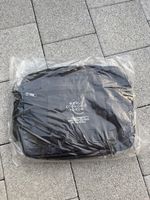 Tasche World Economic Forum neu in Plastik verpackt