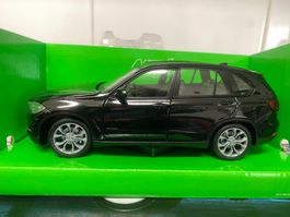 BMW X5 F15 2013-2018 schwarz 1-24 Welly neu & OVP