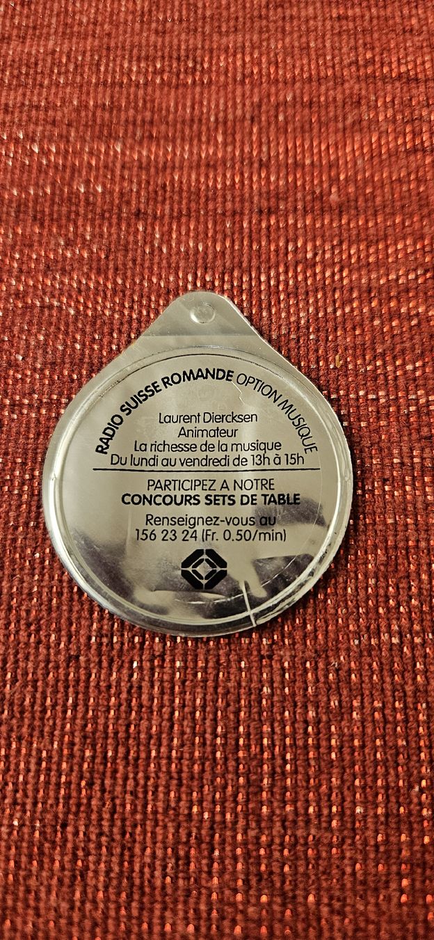 Coperchi dei cremini per caffè: Deckel Radio Suisse Romande Laurent Diercksen – Usato da Basel venduto da Melibu 1