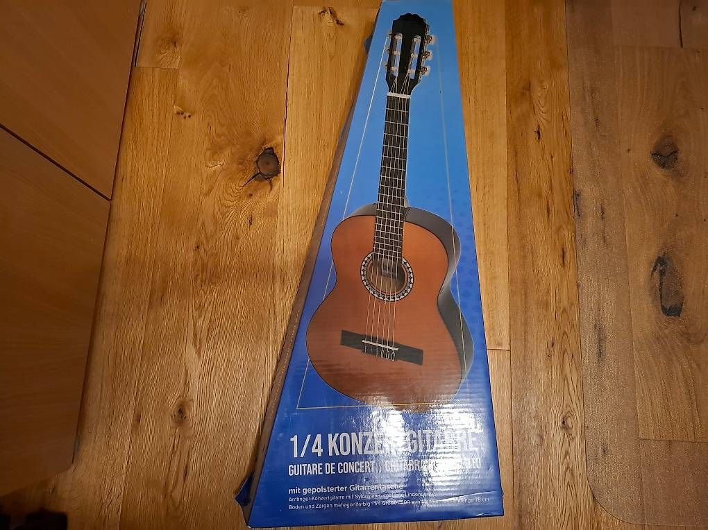 Musikinstrumente: Gitarre 1/4 – Gebraucht aus Halten von Mutzji