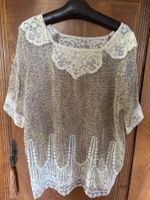Bluse aus Seide und Spitze, hergestellt in Italien