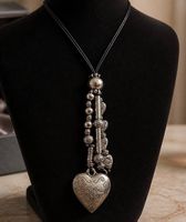 Collier en acier inoxydable et cuire