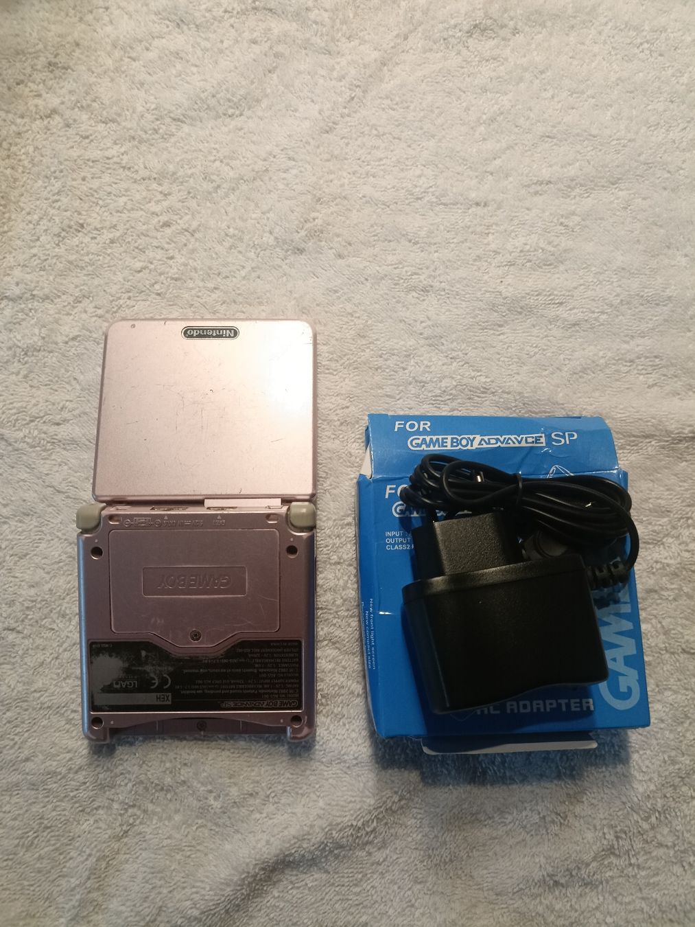 Gameboy Advance SP Rosa sowie 8 Spiele und Adapter (Neu (gemäss ...