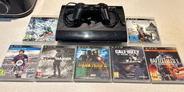 Playstation 3 mit diversen Videospielen