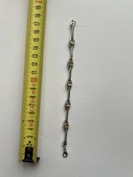 Semi-rigid bracelet with yellow stones