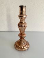 Dekorativer rosegold Kerzenständer