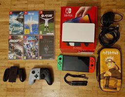 Nintendo Switch OLED + accessoires + 6 jeux + housse