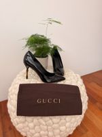 Gucci Pumps aus schwarzem Lackleder, ikonischer Bambusabsatz