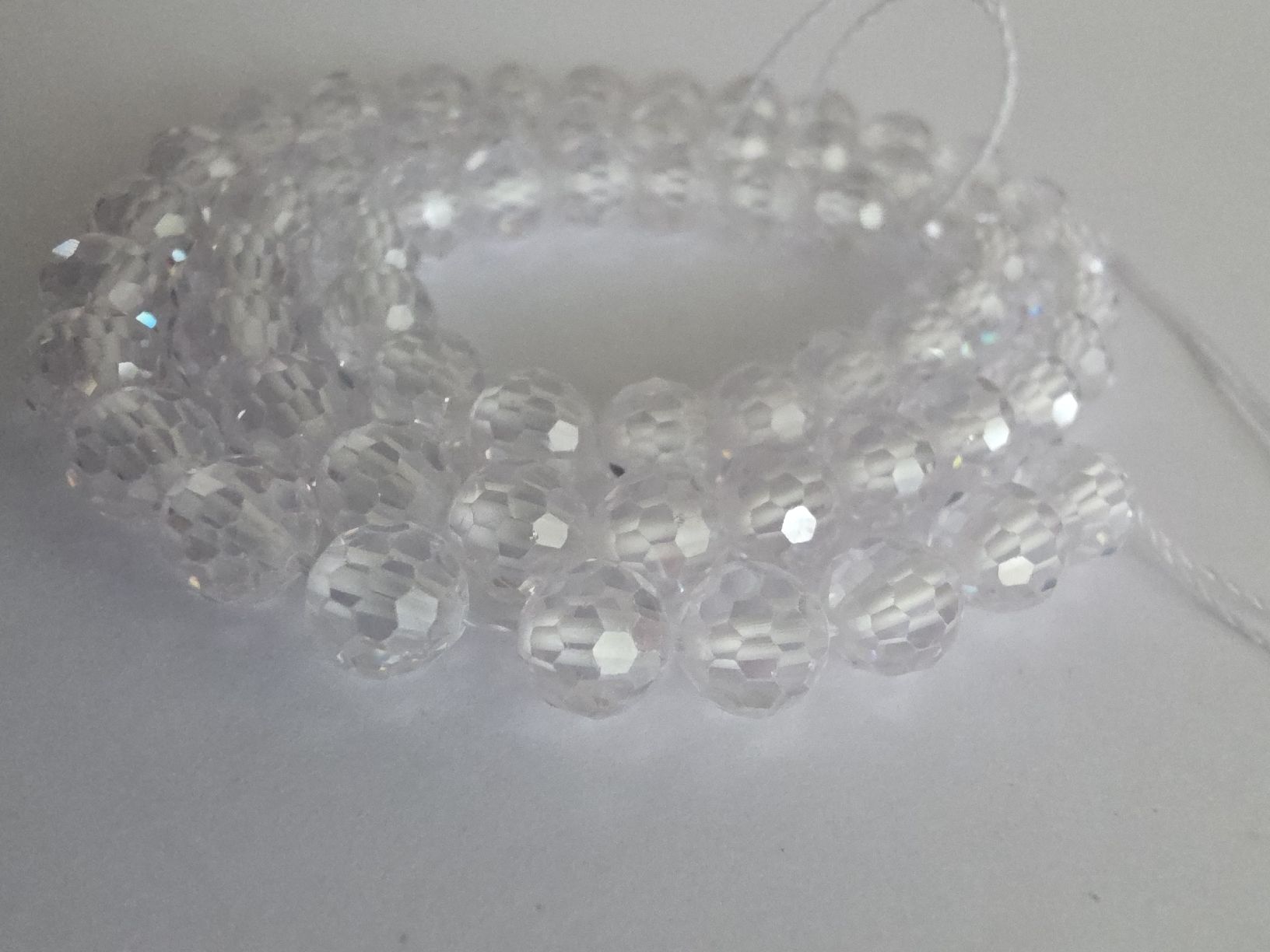 Minerali & Pietre curative: Zirkon weiss facettiert 6mm. Strang – Nuovo e nell'imballaggio originale da Menziken venduto da Mirager 3