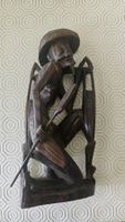 Statua etnica in legno stile asiatico