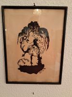 Scherenschnitt Die Frau auf dem Baum