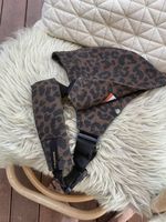 WildRIDE Babytrage Leo Print