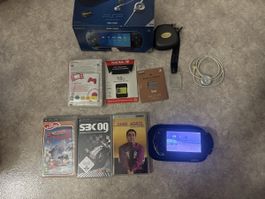 Psp en boîte avec 2 jeux et 1 film 