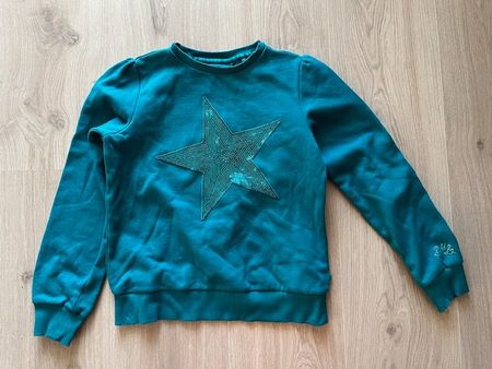 Toller Pullover mit Sternpaillette 146/152
