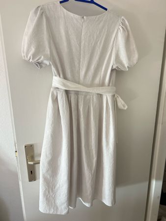 Women's white dress with puff sleeves, it’s new