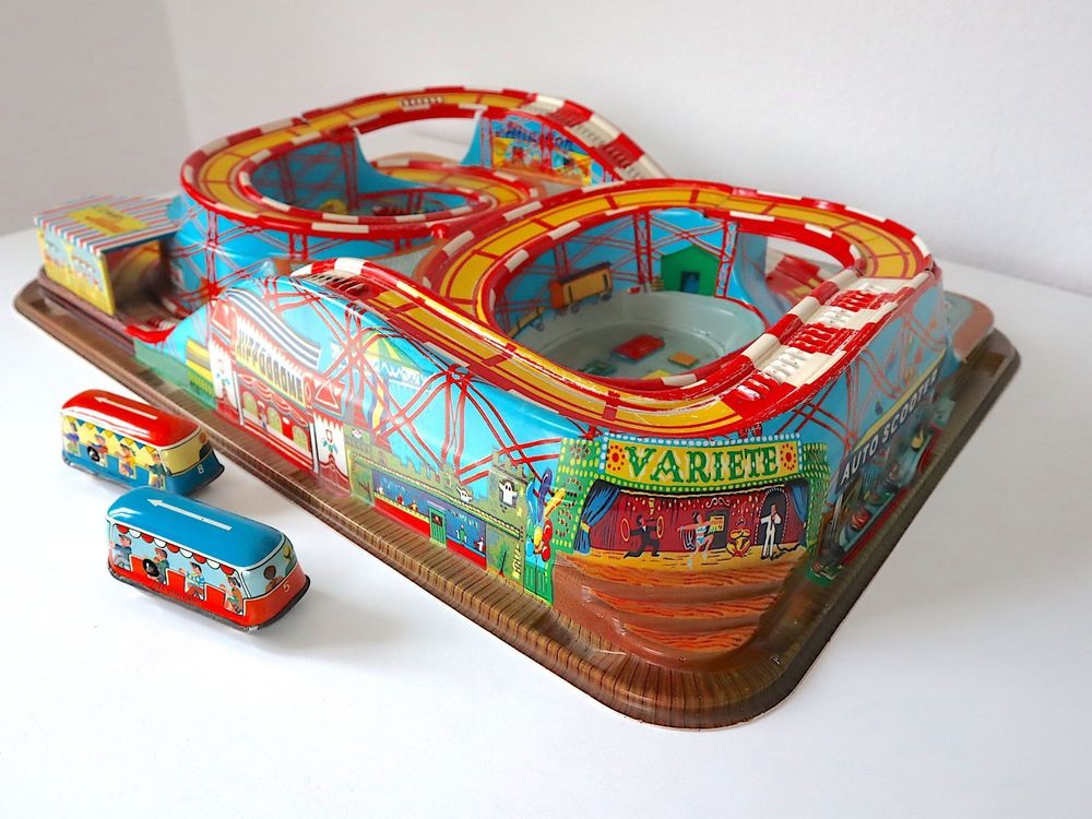 A boxed Technofix Coney Island 307made in Germany tinplate and early plastic roller coaster clockwor