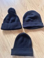 3 schwarze Mützen