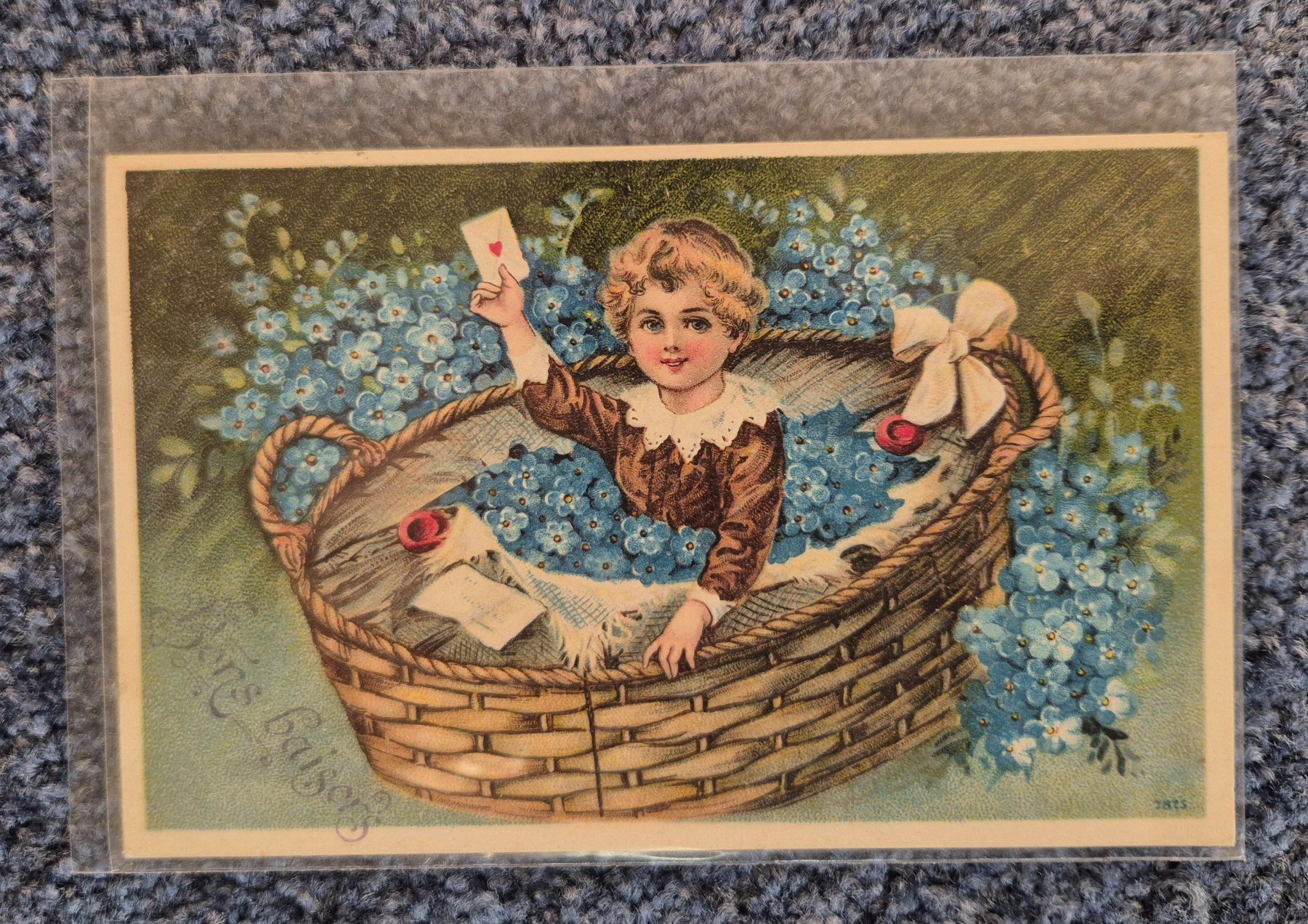 Cartoline postali: Carte postale ancienne, image enfant dans panier fleurs – Usato da Domat/Ems venduto da ver_7q9b