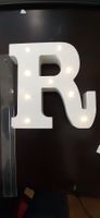 Leuchtende Buchstabe, ein R