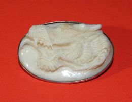 Drachenkopf als Anhänger/Brosche