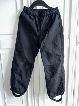 Children’s black rain play pants 122 6 Y 
