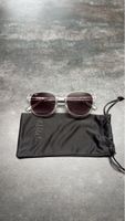 Lunettes de soleil  monture transparente brillante 