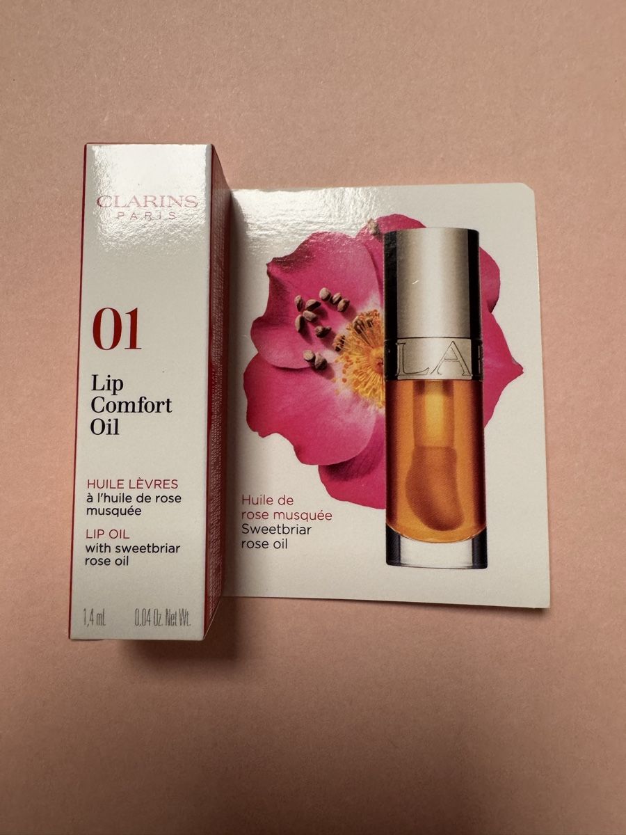 Clarins Cura del viso: Clarins lip comfort oil mini 1.4ml – Nuovo e nell'imballaggio originale da Bellach venduto da Lea068