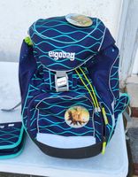 Schulthek mit Etui und Regenpellerine