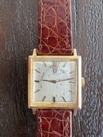 Omega quadratisch goldfarben gebrauchter Zustand