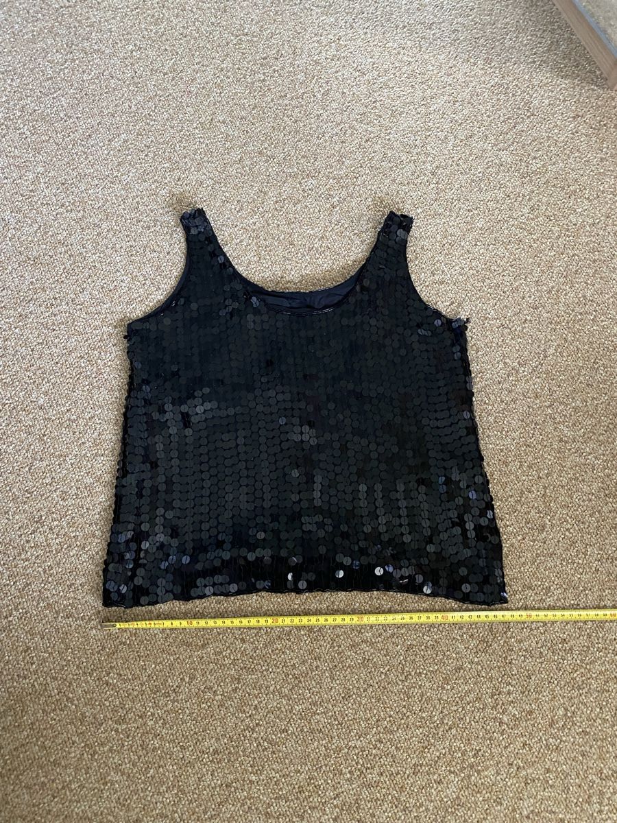 Top: Top noir paillettes taille 36 – Usato da Küssnacht am Rigi venduto da CALIFRASQUI 2
