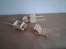 3 mini Deko Schubkarren aus Holz. Gemäss Bildern