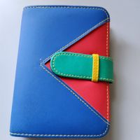 Agenda Hülle in den Farben blau - rot - grün - gelb