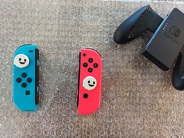 Original Nintendo Switch Joy-Con Set (Neon-Rot/Blau) + Grip